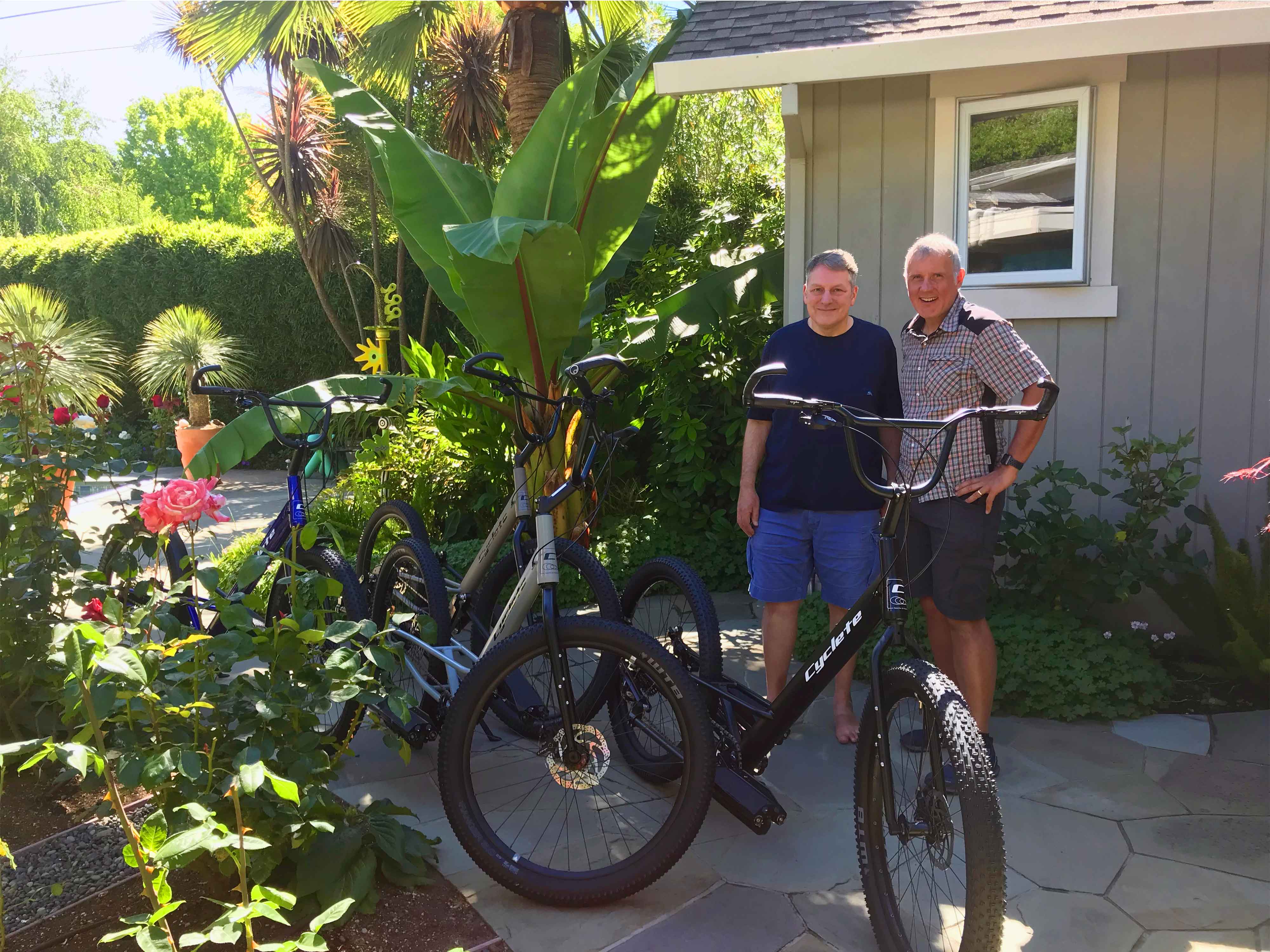 Photo of our new Cycletes, standing outside of Cyclete Cottage with inventor/designer/builder Steven Ascher